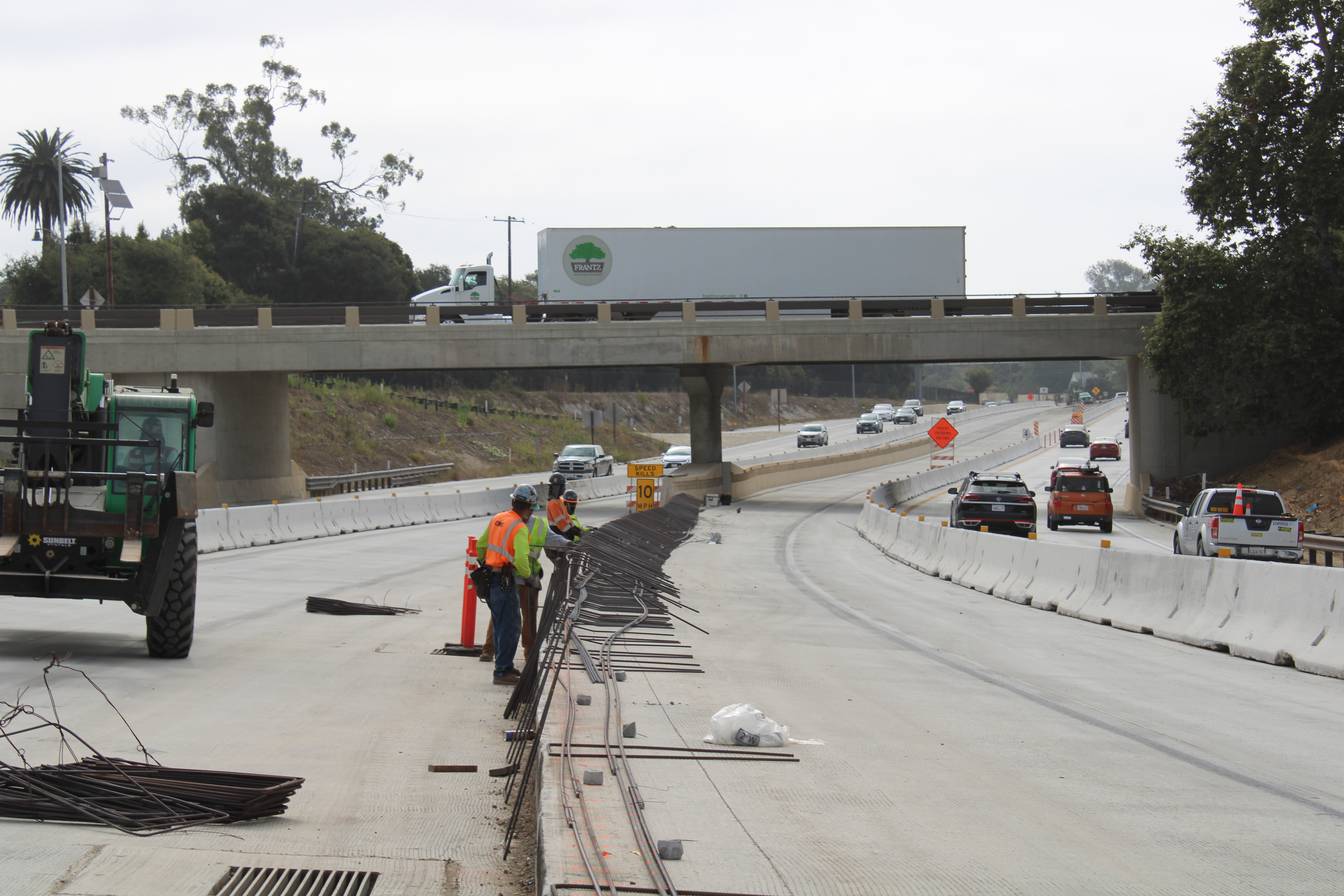 Construction crew works in Highway 101 Santa Barbara South median